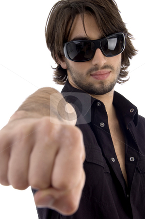 To use this stock image in your creative project, please select the size you need over to the right and click the "Add to Cart" button.
Your downloaded image will come with the Cutcaster watermark removed so don’t worry about the watermark you see on this page. Young male showing punch stock photo, Young male showing punch on an isolated white background by Imagery Majestic