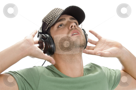 To use this stock image in your creative project, please select the size you need over to the right and click the "Add to Cart" button.
Your downloaded image will come with the Cutcaster watermark removed so don’t worry about the watermark you see on this page. Young man with cap and headphone stock photo, Young man with cap and headphone on an isolated background by Imagery Majestic