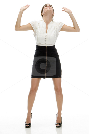 To use this stock image in your creative project, please select the size you need over to the right and click the "Add to Cart" button.
Your downloaded image will come with the Cutcaster watermark removed so don’t worry about the watermark you see on this page. Standing gorgeous lady looking upward stock photo, Standing gorgeous lady looking upward on an isolated white background by Imagery Majestic