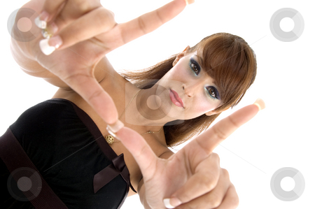 To use this stock image in your creative project, please select the size you need over to the right and click the "Add to Cart" button.
Your downloaded image will come with the Cutcaster watermark removed so don’t worry about the watermark you see on this page. Gorgeous woman showing hand gesture stock photo, Gorgeous woman showing hand gesture with white background by Imagery Majestic