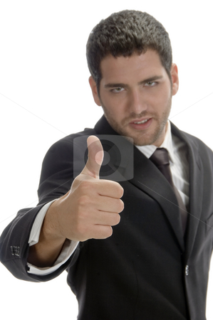 To use this stock image in your creative project, please select the size you need over to the right and click the "Add to Cart" button.
Your downloaded image will come with the Cutcaster watermark removed so don’t worry about the watermark you see on this page. Businessman showing thumb stock photo, Businessman showing thumb on an isolated background by Imagery Majestic
