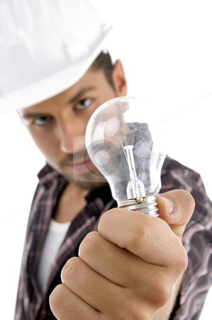 To use this stock image in your creative project, please select the size you need over to the right and click the "Add to Cart" button.
Your downloaded image will come with the Cutcaster watermark removed so don’t worry about the watermark you see on this page. Young architect showing electric bulb stock photo, Young architect showing electric bulb on an isolated white background by Imagery Majestic