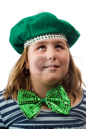 To use this stock image in your creative project, please select the size you need over to the right and click the "Add to Cart" button.
Your downloaded image will come with the Cutcaster watermark removed so don’t worry about the watermark you see on this page. Saint Patricks Day stock photo, A young girl wearing a green hat and bowtie is looking up with her eyes, isolated against a white background by Richard Nelson