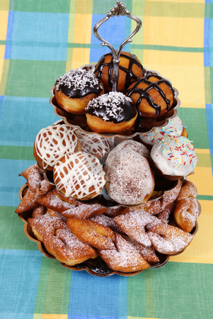 To use this stock image in your creative project, please select the size you need over to the right and click the "Add to Cart" button.
Your downloaded image will come with the Cutcaster watermark removed so don’t worry about the watermark you see on this page. Doughnut stock photo, Fresh doughnuts and pastry straws as background by Jolanta Dabrowska