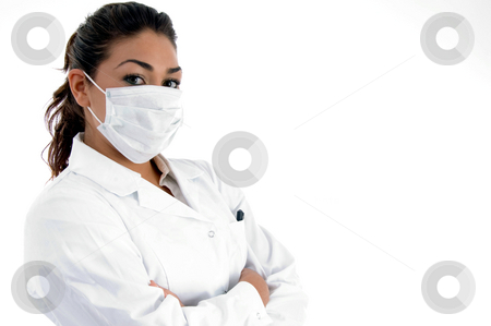 To use this stock image in your creative project, please select the size you need over to the right and click the "Add to Cart" button.
Your downloaded image will come with the Cutcaster watermark removed so don’t worry about the watermark you see on this page. Side view of doctor with mask on her mouth stock photo, Side view of doctor with mask on her mouth on an isolated white background by Imagery Majestic