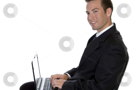 To use this stock image in your creative project, please select the size you need over to the right and click the "Add to Cart" button.
Your downloaded image will come with the Cutcaster watermark removed so don’t worry about the watermark you see on this page. Successful businessman with laptop stock photo, Successful businessman with laptop against white background by Imagery Majestic