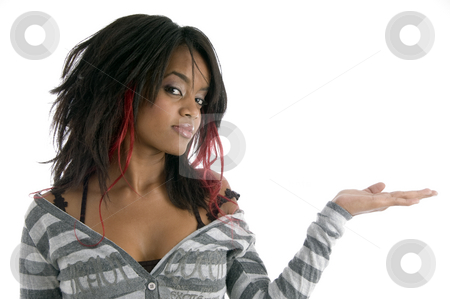To use this stock image in your creative project, please select the size you need over to the right and click the "Add to Cart" button.
Your downloaded image will come with the Cutcaster watermark removed so don’t worry about the watermark you see on this page. Girl showing her palm stock photo, Girl showing her palm on an isolated background by Imagery Majestic