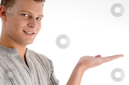 To use this stock image in your creative project, please select the size you need over to the right and click the "Add to Cart" button.
Your downloaded image will come with the Cutcaster watermark removed so don’t worry about the watermark you see on this page. Smiling man with open palm stock photo, Smiling man with open palm on an isolated background by Imagery Majestic