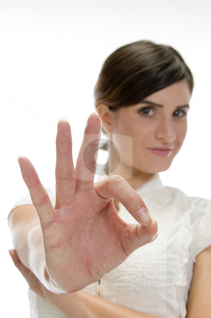 To use this stock image in your creative project, please select the size you need over to the right and click the "Add to Cart" button.
Your downloaded image will come with the Cutcaster watermark removed so don’t worry about the watermark you see on this page. Lady showing ok sign stock photo, Lady showing ok sign on an isolated background by Imagery Majestic