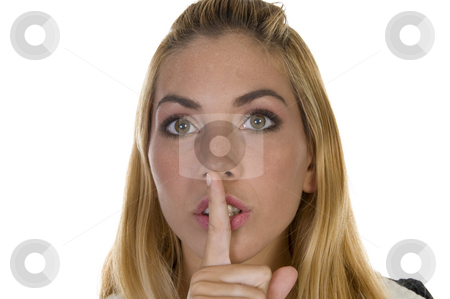 To use this stock image in your creative project, please select the size you need over to the right and click the "Add to Cart" button.
Your downloaded image will come with the Cutcaster watermark removed so don’t worry about the watermark you see on this page. Beautiful woman shushing stock photo, Beautiful woman shushing on an isolated white background by Imagery Majestic