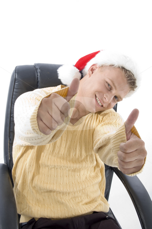 To use this stock image in your creative project, please select the size you need over to the right and click the "Add to Cart" button.
Your downloaded image will come with the Cutcaster watermark removed so don’t worry about the watermark you see on this page. Man showing both thumbs up stock photo, Man showing both thumbs up on an isolated background by Imagery Majestic