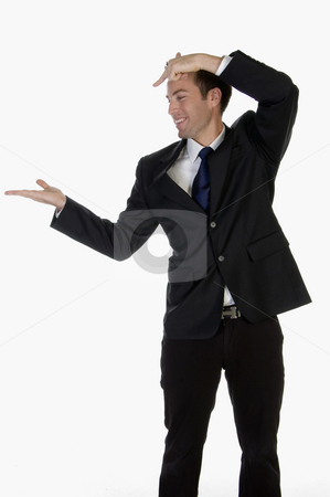 To use this stock image in your creative project, please select the size you need over to the right and click the "Add to Cart" button.
Your downloaded image will come with the Cutcaster watermark removed so don’t worry about the watermark you see on this page. Man pointing on palm stock photo, Man pointing on palm on an isolated background by Imagery Majestic