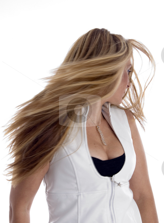 To use this stock image in your creative project, please select the size you need over to the right and click the "Add to Cart" button.
Your downloaded image will come with the Cutcaster watermark removed so don’t worry about the watermark you see on this page. Woman blowing her hair stock photo, Woman blowing her hair with white background by Imagery Majestic