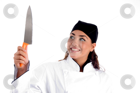 To use this stock image in your creative project, please select the size you need over to the right and click the "Add to Cart" button.
Your downloaded image will come with the Cutcaster watermark removed so don’t worry about the watermark you see on this page. Smiling chef with knife stock photo, Smiling chef with knife on an isolated background by Imagery Majestic