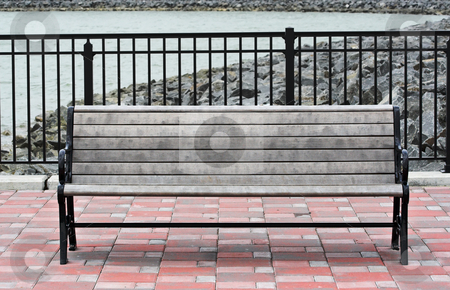 To use this stock image in your creative project, please select the size you need over to the right and click the "Add to Cart" button.
Your downloaded image will come with the Cutcaster watermark removed so don’t worry about the watermark you see on this page. Park Bench stock photo, A park bench at a reservoir. The bench is on a brick patio and the background is water and rock. by Stephen Bonk