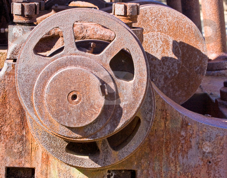 To use this stock image in your creative project, please select the size you need over to the right and click the "Add to Cart" button.
Your downloaded image will come with the Cutcaster watermark removed so don’t worry about the watermark you see on this page. Gears stock photo, Metal gears from an old steam engine train by Stephen Bonk