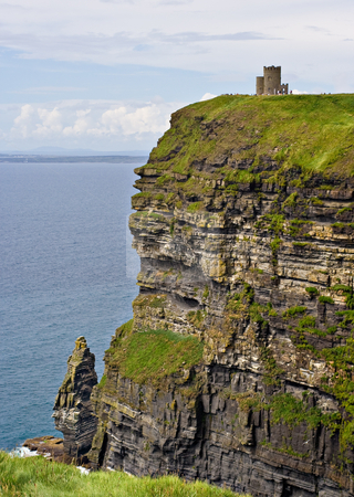 To use this stock image in your creative project, please select the size you need over to the right and click the "Add to Cart" button.
Your downloaded image will come with the Cutcaster watermark removed so don’t worry about the watermark you see on this page. O'Briens Tower stock photo, O'Briens Tower on top of The Cliffs of Moher in County Clare, Ireland by Stephen Bonk