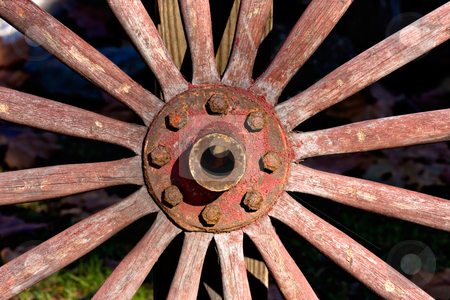 To use this stock image in your creative project, please select the size you need over to the right and click the "Add to Cart" button.
Your downloaded image will come with the Cutcaster watermark removed so don’t worry about the watermark you see on this page. Wagon Wheel stock photo, Closeup of an old, antique wagon wheel by Stephen Bonk