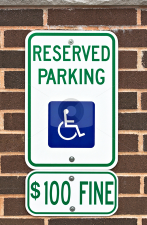 To use this stock image in your creative project, please select the size you need over to the right and click the "Add to Cart" button.
Your downloaded image will come with the Cutcaster watermark removed so don’t worry about the watermark you see on this page. Reserved Parking Sign stock photo, A reserved parking sign on a brick wall. There is a picture or symbol of a wheelchair on the sign along with a message for a one hundred dollar fine. by Stephen Bonk