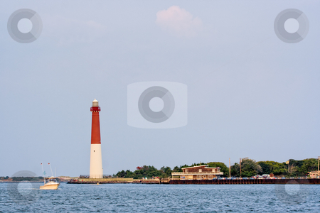 To use this stock image in your creative project, please select the size you need over to the right and click the "Add to Cart" button.
Your downloaded image will come with the Cutcaster watermark removed so don’t worry about the watermark you see on this page. Lighthouse stock photo, Barengat Lighthouse at Long Beach Island, New Jersey. This lighthouse is nicknamed Old Barney. by Stephen Bonk