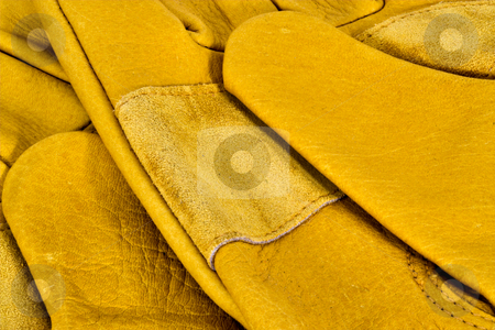 To use this stock image in your creative project, please select the size you need over to the right and click the "Add to Cart" button.
Your downloaded image will come with the Cutcaster watermark removed so don’t worry about the watermark you see on this page. Leather Work Gloves stock photo, Closeup of yellow leather work gloves by Stephen Bonk