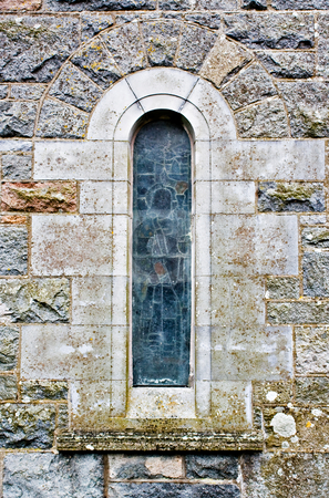 To use this stock image in your creative project, please select the size you need over to the right and click the "Add to Cart" button.
Your downloaded image will come with the Cutcaster watermark removed so don’t worry about the watermark you see on this page. Church Window stock photo, An old church window showing much detail and texture by Stephen Bonk