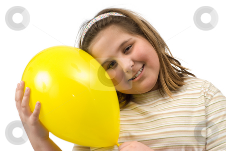 To use this stock image in your creative project, please select the size you need over to the right and click the "Add to Cart" button.
Your downloaded image will come with the Cutcaster watermark removed so don’t worry about the watermark you see on this page. Girl With Balloon stock photo, A young girl smiling and holding a yellow balloon, isolated against a white background by Richard Nelson