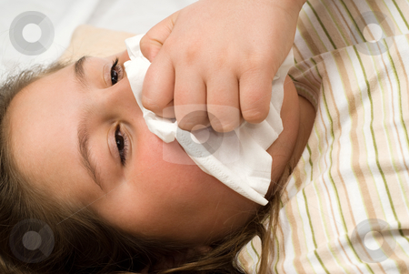 To use this stock image in your creative project, please select the size you need over to the right and click the "Add to Cart" button.
Your downloaded image will come with the Cutcaster watermark removed so don’t worry about the watermark you see on this page. Blowing Nose stock photo, Closeup view of a young girl blowing her nose with a tissue by Richard Nelson