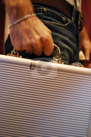 To use this stock image in your creative project, please select the size you need over to the right and click the "Add to Cart" button.
Your downloaded image will come with the Cutcaster watermark removed so don’t worry about the watermark you see on this page. Holding Case stock photo, Man carrying a briefcase with natural background by Tudor Antonel adrian