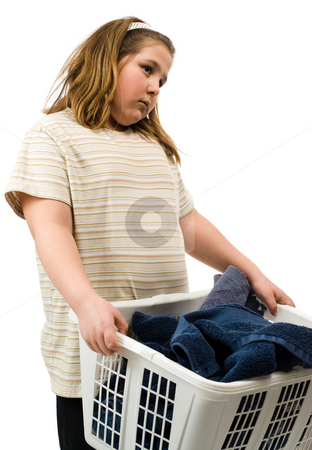 To use this stock image in your creative project, please select the size you need over to the right and click the "Add to Cart" button.
Your downloaded image will come with the Cutcaster watermark removed so don’t worry about the watermark you see on this page. Laundry stock photo, A young girl holding a basket of dirty towels that she is going to wash by Richard Nelson