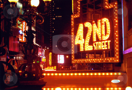 To use this stock image in your creative project, please select the size you need over to the right and click the "Add to Cart" button.
Your downloaded image will come with the Cutcaster watermark removed so don’t worry about the watermark you see on this page. 42nd Street - Times Square stock photo, This is near broadway on 42nd street in new york city. by Todd Arena