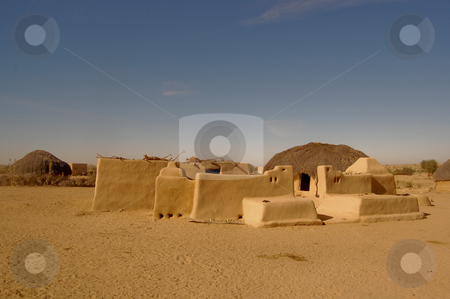 To use this stock image in your creative project, please select the size you need over to the right and click the "Add to Cart" button.
Your downloaded image will come with the Cutcaster watermark removed so don’t worry about the watermark you see on this page. Desert hut stock photo, Typical desert huts in the indian State of Rajasthan... by Piero Biondo