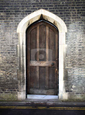 To use this stock image in your creative project, please select the size you need over to the right and click the "Add to Cart" button.
Your downloaded image will come with the Cutcaster watermark removed so don’t worry about the watermark you see on this page. Gothic arched Door in Cambridge UK stock photo, A gothic arched door from Cambridge in the united kingdom by Mark Allchin