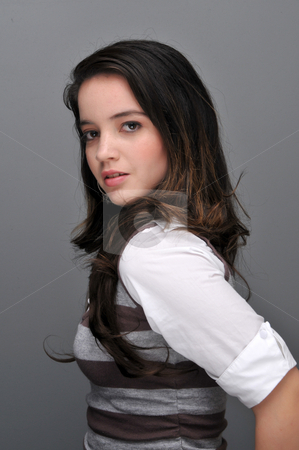 To use this stock image in your creative project, please select the size you need over to the right and click the "Add to Cart" button.
Your downloaded image will come with the Cutcaster watermark removed so don’t worry about the watermark you see on this page. Brunette stock photo, Pretty young brunette in a striped pullover by Harris Shiffman