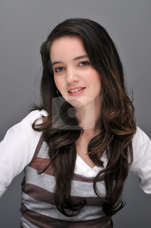 To use this stock image in your creative project, please select the size you need over to the right and click the "Add to Cart" button.
Your downloaded image will come with the Cutcaster watermark removed so don’t worry about the watermark you see on this page. Brunette stock photo, Pretty young brunette in a striped pullover by Harris Shiffman