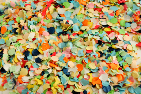 To use this stock image in your creative project, please select the size you need over to the right and click the "Add to Cart" button.
Your downloaded image will come with the Cutcaster watermark removed so don’t worry about the watermark you see on this page. Confetti stock photo, Texture of round paper colorful confetti by ALESSANDRO TERMIGNONE