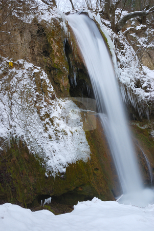 To use this stock image in your creative project, please select the size you need over to the right and click the "Add to Cart" button.
Your downloaded image will come with the Cutcaster watermark removed so don’t worry about the watermark you see on this page. Waterfall in winter stock photo, Waterfall surrounded with snow and icicles by Ivan Paunovic