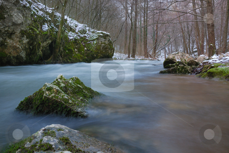 To use this stock image in your creative project, please select the size you need over to the right and click the "Add to Cart" button.
Your downloaded image will come with the Cutcaster watermark removed so don’t worry about the watermark you see on this page. River in winter stock photo, Low angle view on a river in winter. by Ivan Paunovic