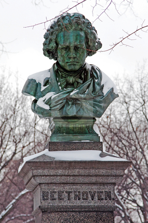 To use this stock image in your creative project, please select the size you need over to the right and click the "Add to Cart" button.
Your downloaded image will come with the Cutcaster watermark removed so don’t worry about the watermark you see on this page. Statue of Ludwig van Beethoven stock photo, Snow covered green copper statue of Ludwig van Beethoven in the mall in Central Park, New York City by Paul Hakimata