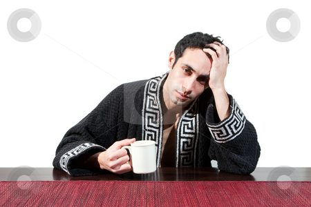 To use this stock image in your creative project, please select the size you need over to the right and click the "Add to Cart" button.
Your downloaded image will come with the Cutcaster watermark removed so don’t worry about the watermark you see on this page. Morning guy drinking coffee stock photo, Handsome guy in the morning who just woke up sitting at a table in his robe with a cup recovering from his hangover, isolated on white by Paul Hakimata