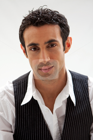 To use this stock image in your creative project, please select the size you need over to the right and click the "Add to Cart" button.
Your downloaded image will come with the Cutcaster watermark removed so don’t worry about the watermark you see on this page. Handsome guy stock photo, Handsome male wearing a white shirt and black pinstripe vest, isolated by Paul Hakimata