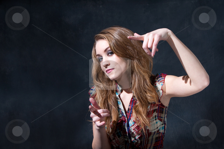 To use this stock image in your creative project, please select the size you need over to the right and click the "Add to Cart" button.
Your downloaded image will come with the Cutcaster watermark removed so don’t worry about the watermark you see on this page. Cool dirty-blond stock photo, Cool rocker country girl with long dirty-blond hair and an attitude by Paul Hakimata