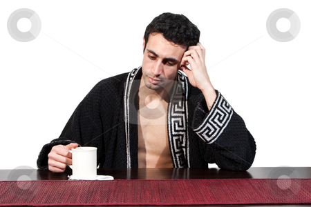 To use this stock image in your creative project, please select the size you need over to the right and click the "Add to Cart" button.
Your downloaded image will come with the Cutcaster watermark removed so don’t worry about the watermark you see on this page. Morning guy drinking coffee stock photo, Handsome guy in the morning who just woke up sitting at a table in his robe with a cup, isolated on white by Paul Hakimata
