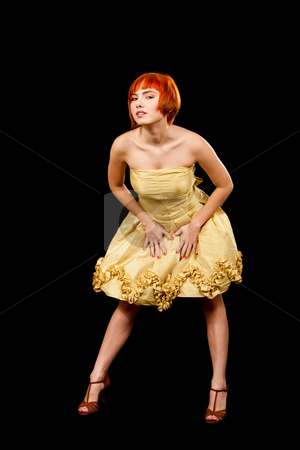 To use this stock image in your creative project, please select the size you need over to the right and click the "Add to Cart" button.
Your downloaded image will come with the Cutcaster watermark removed so don’t worry about the watermark you see on this page. Redhead in yellow dress stock photo, Beautiful Caucasian redhead woman in yellow cocktail dress, isolated by Paul Hakimata