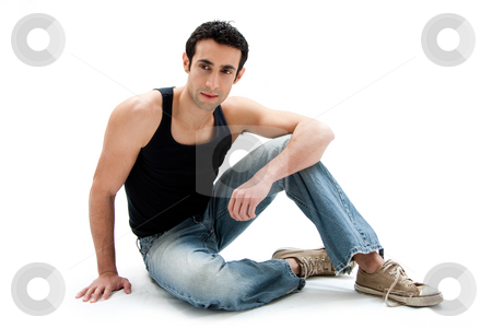 To use this stock image in your creative project, please select the size you need over to the right and click the "Add to Cart" button.
Your downloaded image will come with the Cutcaster watermark removed so don’t worry about the watermark you see on this page. Handsome guy sitting on floor stock photo, Handsome Caucasian guy wearing black tank top and jeans sitting on floor, isolated by Paul Hakimata