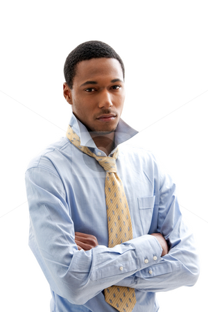 To use this stock image in your creative project, please select the size you need over to the right and click the "Add to Cart" button.
Your downloaded image will come with the Cutcaster watermark removed so don’t worry about the watermark you see on this page. Handsome man stock photo, Handsome African American male in blue shirt and yellow tie with arms crossed and collar up, isolated by Paul Hakimata
