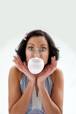 To use this stock image in your creative project, please select the size you need over to the right and click the "Add to Cart" button.
Your downloaded image will come with the Cutcaster watermark removed so don’t worry about the watermark you see on this page. Bubblegum girl stock photo, Beautiful Latina girl with huge eyes open blowing a bubblegum bubble, isolated by Paul Hakimata