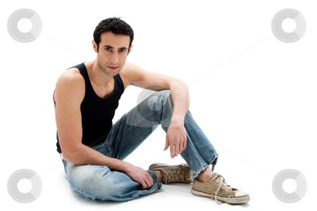 To use this stock image in your creative project, please select the size you need over to the right and click the "Add to Cart" button.
Your downloaded image will come with the Cutcaster watermark removed so don’t worry about the watermark you see on this page. Handsome guy sitting on floor stock photo, Handsome Caucasian guy wearing black tank top and jeans sitting on floor, isolated by Paul Hakimata