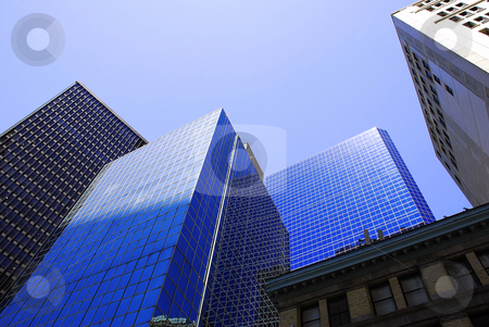 To use this stock image in your creative project, please select the size you need over to the right and click the "Add to Cart" button.
Your downloaded image will come with the Cutcaster watermark removed so don’t worry about the watermark you see on this page. Office modern buildings stock photo, Modern office buildings in New York over blue sky by Julija Sapic