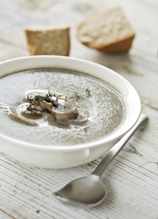 To use this stock image in your creative project, please select the size you need over to the right and click the "Add to Cart" button.
Your downloaded image will come with the Cutcaster watermark removed so don’t worry about the watermark you see on this page. Mushroom soup stock photo, Homemade creamy mushrooms soup with thyme by Liv Friis-Larsen